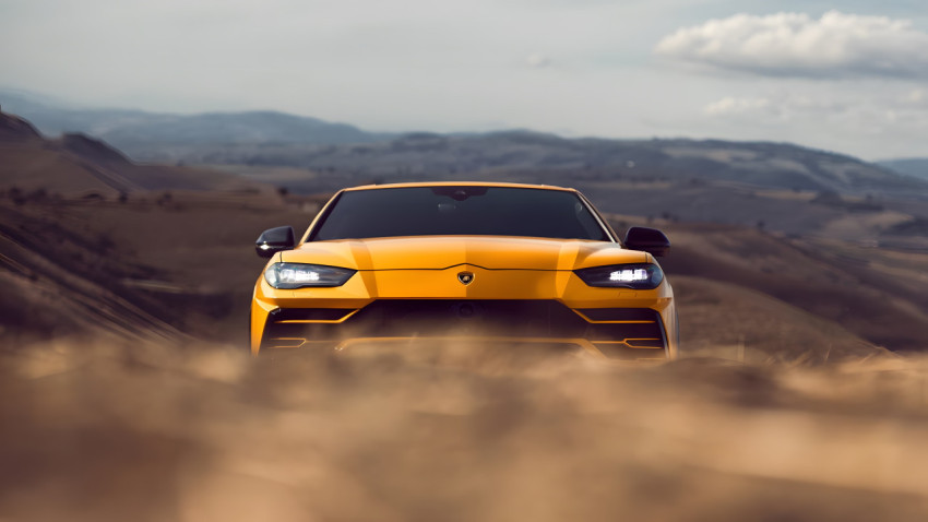 Bold Lamborghini Car on Highway