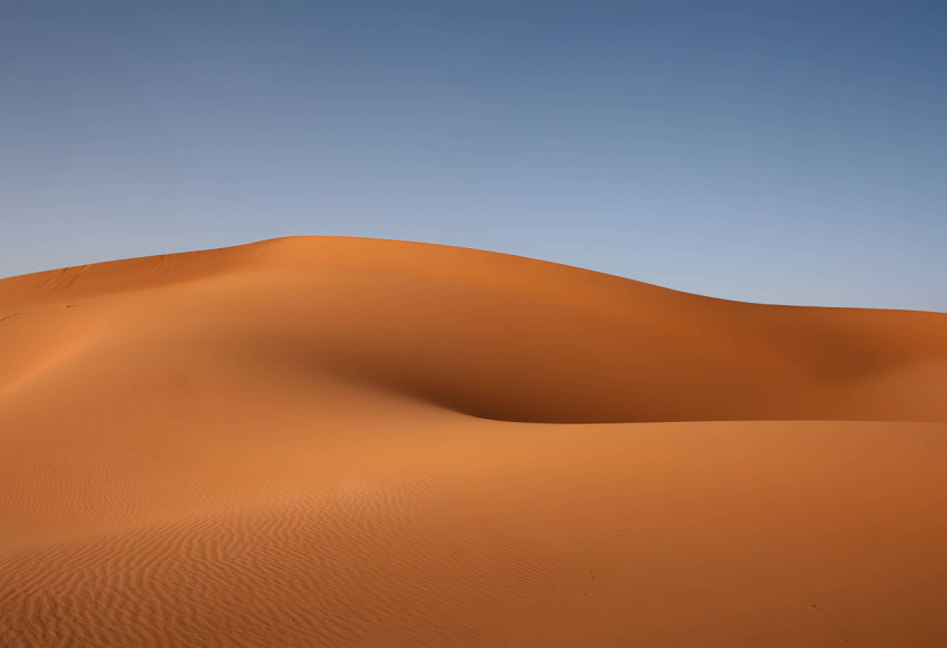 Vast Desert Sky Over Sand Dune Image