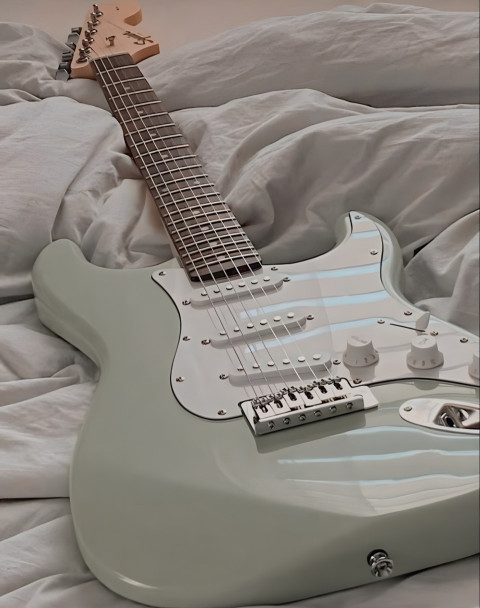 Minimalist Sage Green Guitar Wallpaper for Android