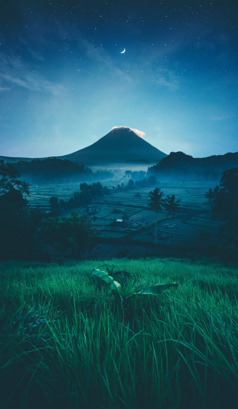 Starry Sky Above Mountains Background