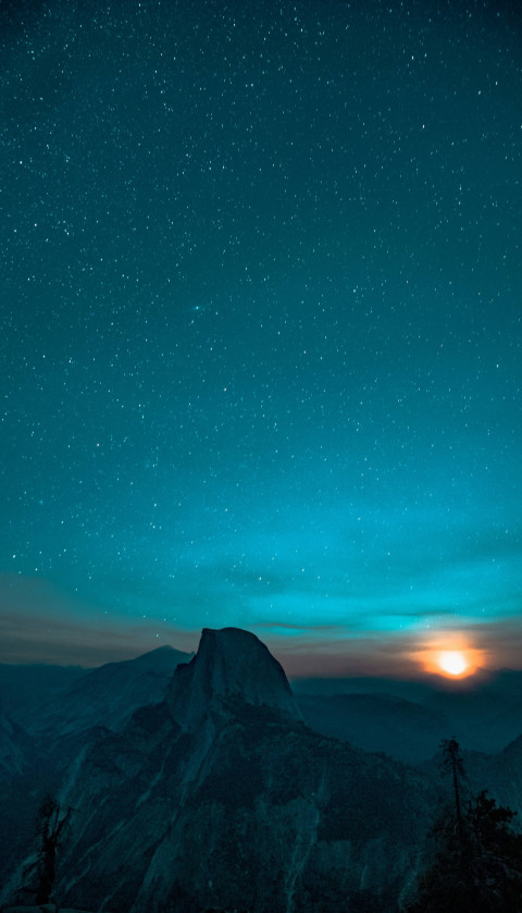 4K Starry Sky Above Mountains Background