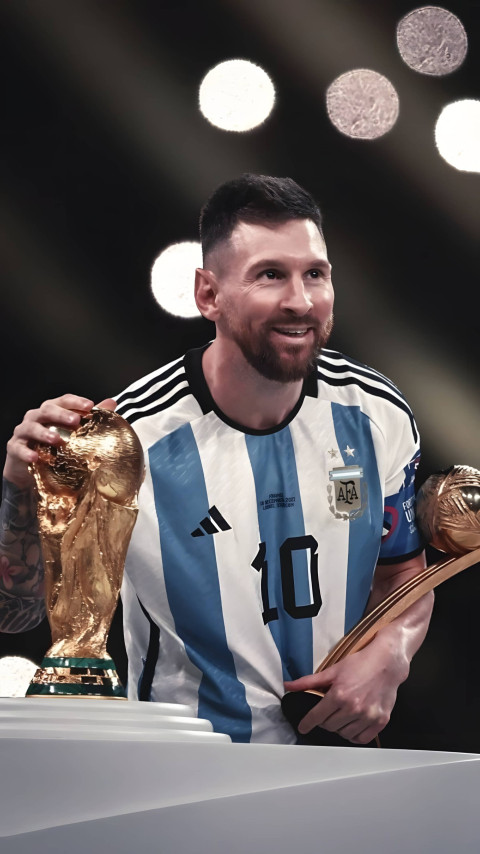 Messi Holding Trophy Wallpaper