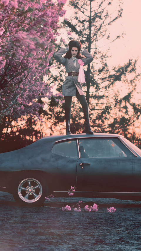 Beautiful Lana Del Rey stand on car Wallpaper for Phone