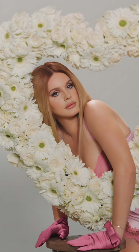 Elegant Lana Del Rey with Flowers Wallpaper for Your Phone Screen