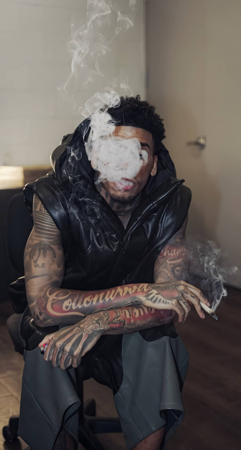 Stylish NLE Choppa Smoking Wallpaper for Smartphone