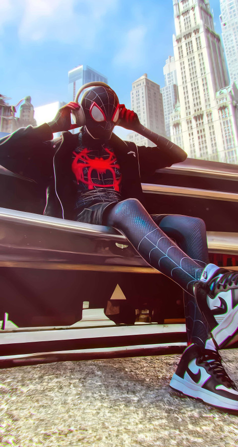 Spiderman Swinging Over Skyscrapers Image