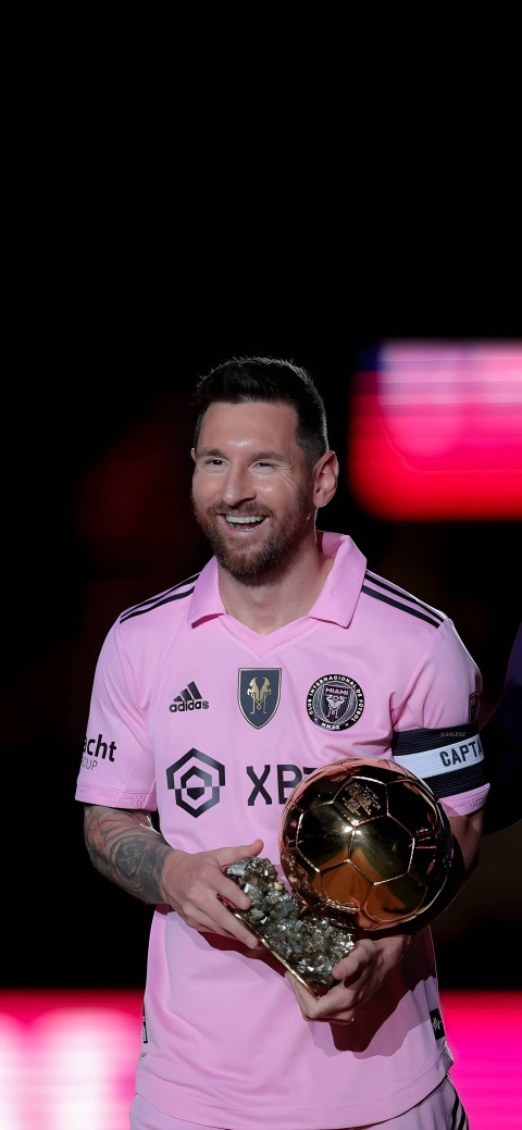 Messi Holding Trophy 4K Wallpaper